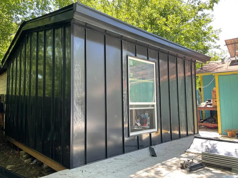 Black standing seam metal wall panels for Metal Roof Installation in Edgemere