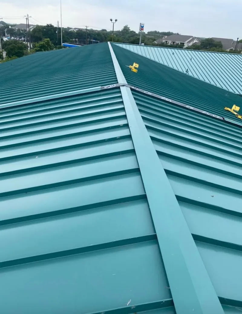 Green commercial metal roof ridge and valley for Metal Roof Repair in Edgemere