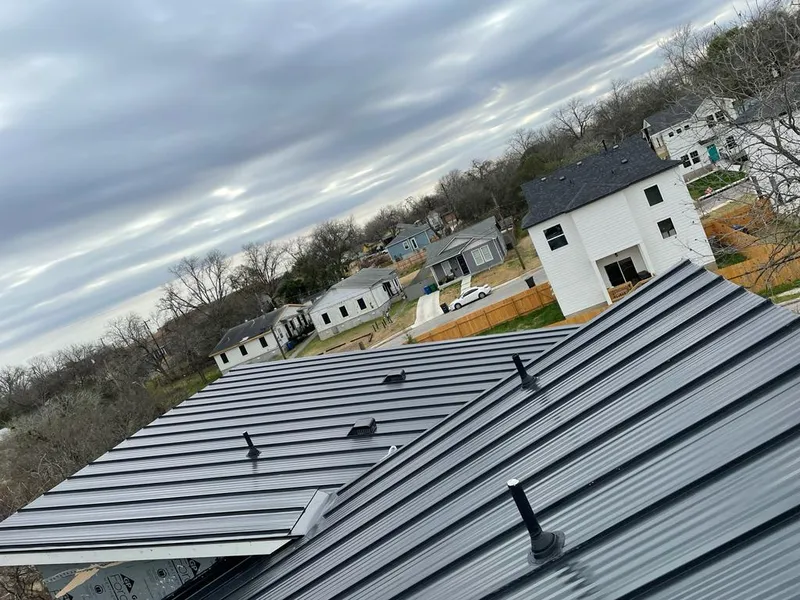 Standing seam metal roof panels with vents for Skylight Repair in Edgemere